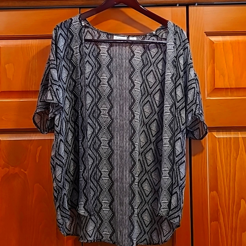 Sweet cover to snazz up your outfit.  Size S/M